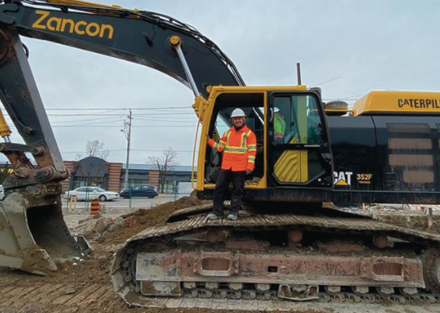 Technically A Tech wearing safety gear on her job site.